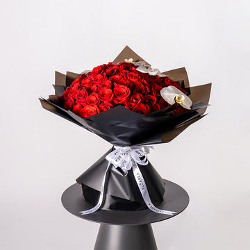 100-roses-&-orchid-bouquet-940-aed-1